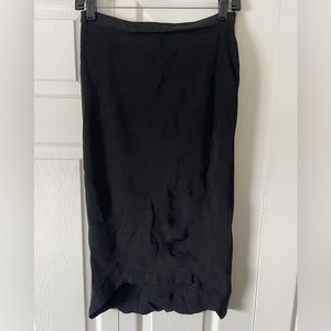 H&M Black ribbed second skin fitted midi skirt.  Size 8.